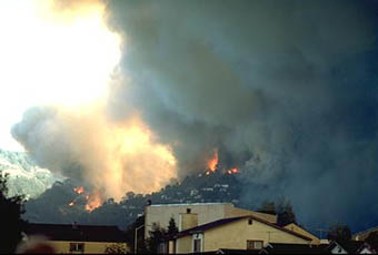 Large fire on populated hillside